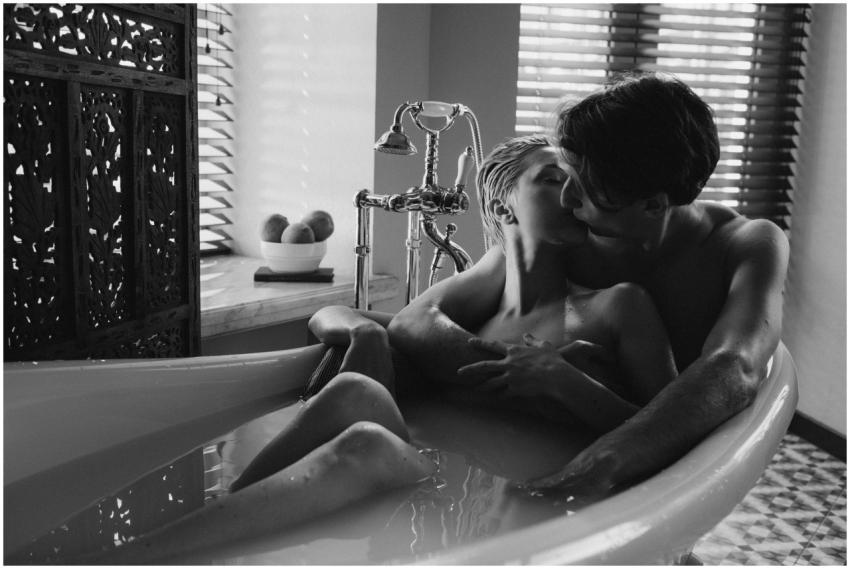 A couple sharing an intimate moment in a vintage f