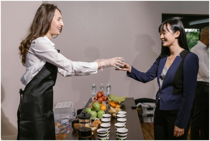 Two professionals interacting at a catered busines