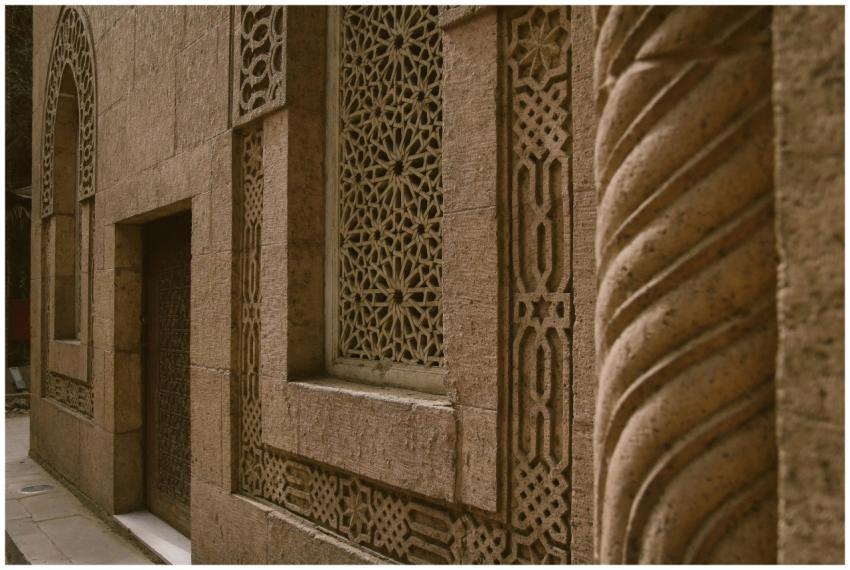 Close-up of a historic building's ornate stone fac