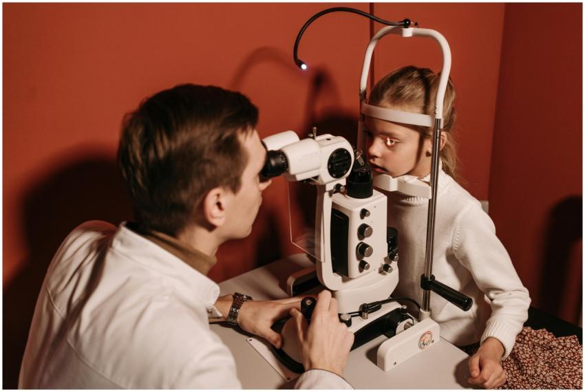 Optometrist conducting a detailed eye examination