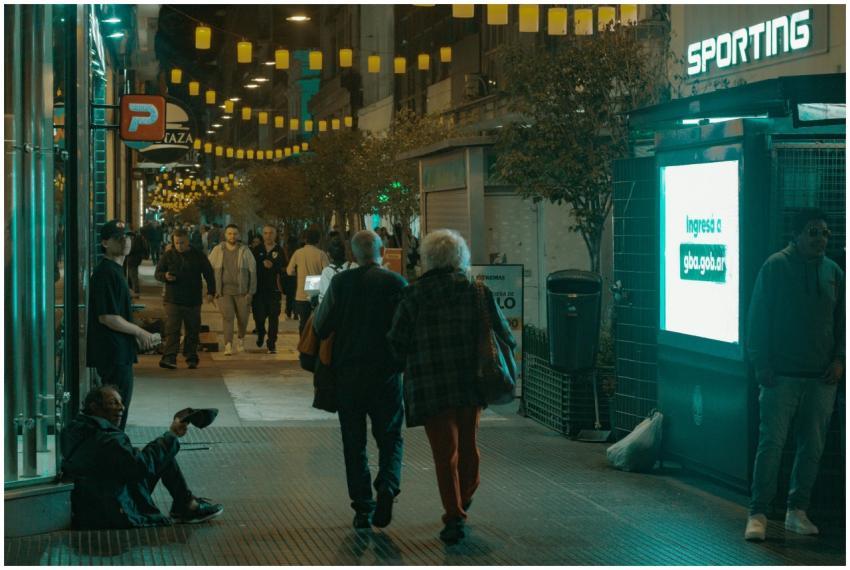 Vibrant nighttime scene of a bustling street in Bu