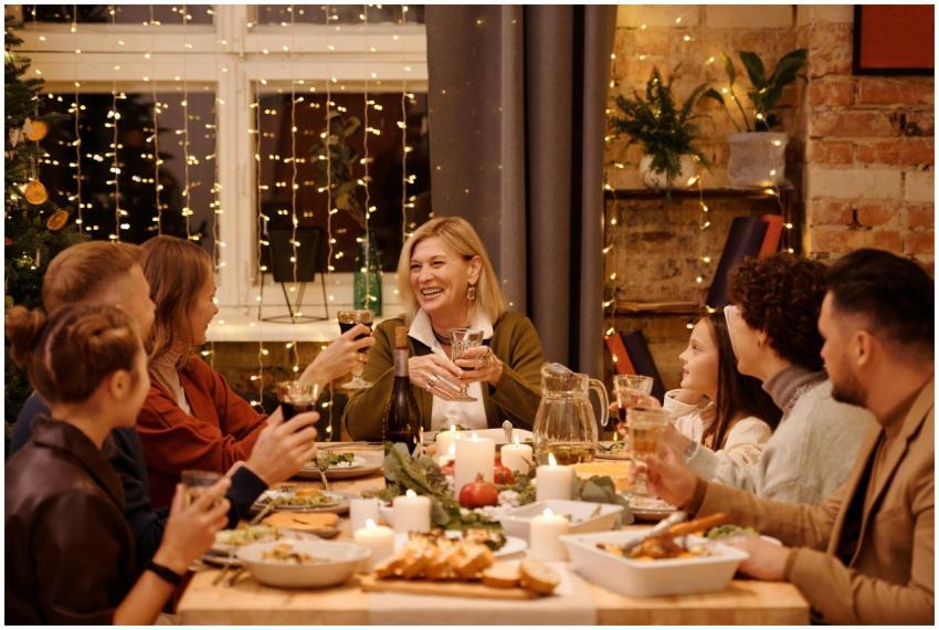 A joyful family gathering around a festive Christm