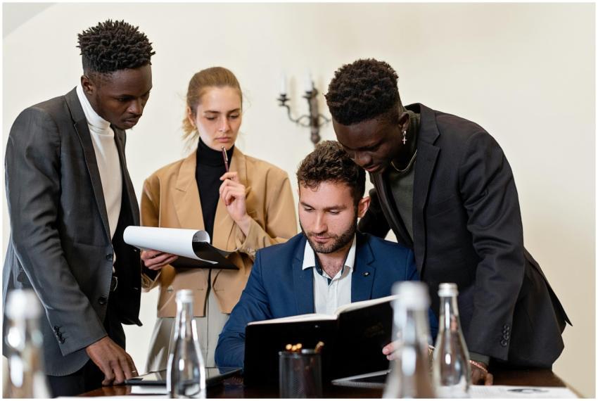 A diverse team of professionals collaborating arou