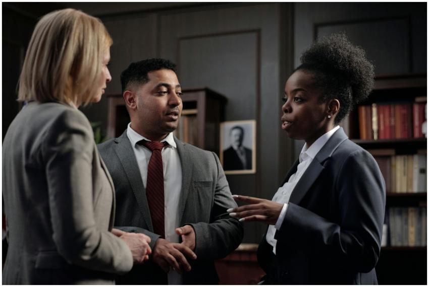 Diverse professionals engaged in strategic discuss