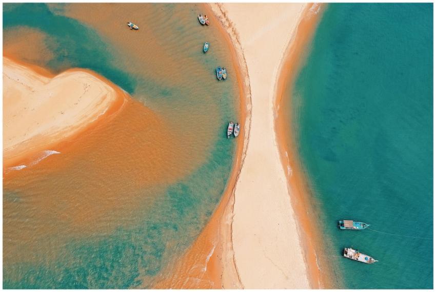 Stunning aerial shot of boats along the vibrant Ke