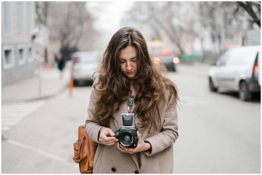 Young pensive female with long hair in casual outf