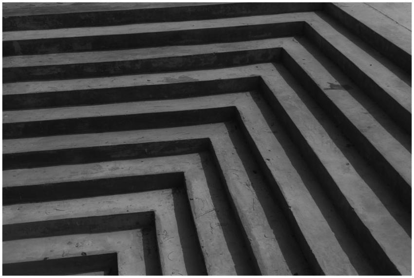 Close-up of geometric concrete steps showcasing ur