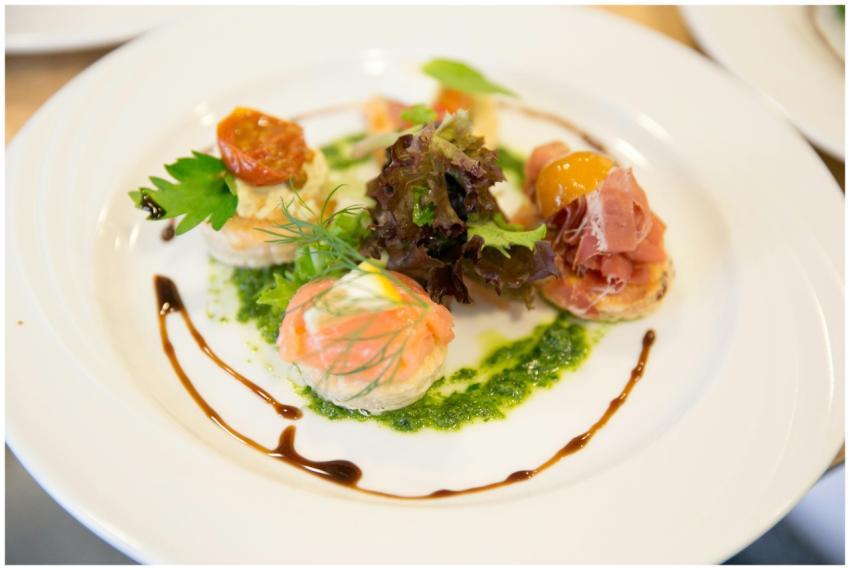 A beautifully plated gourmet dish featuring smoked