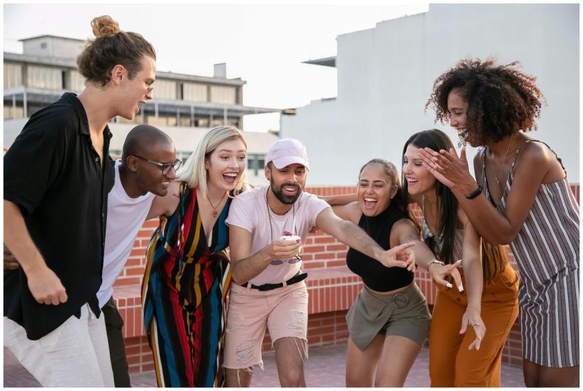 Group of young cheerful diverse male and female fr