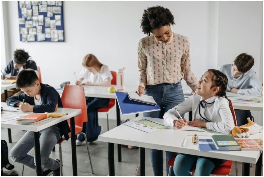 A diverse group of students engaged in learning wi