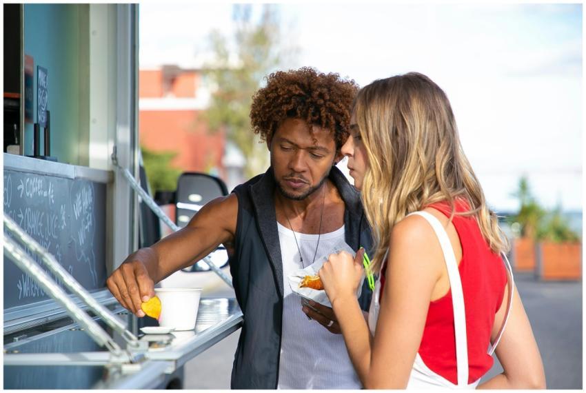 Hungry young black man and woman in casual clothes