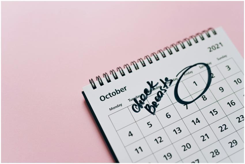October calendar with breast check reminder, empha