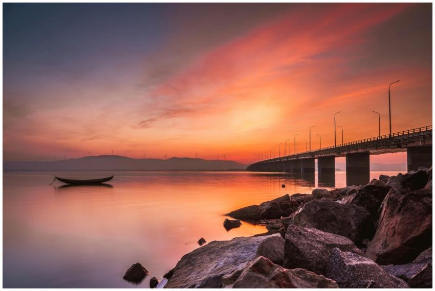 Beautiful sunset over Quy Nhơn beach with a tranqu