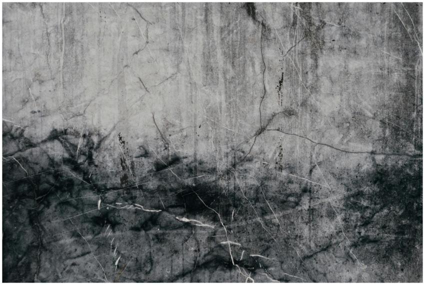 Close-up of a textured grunge concrete wall with a