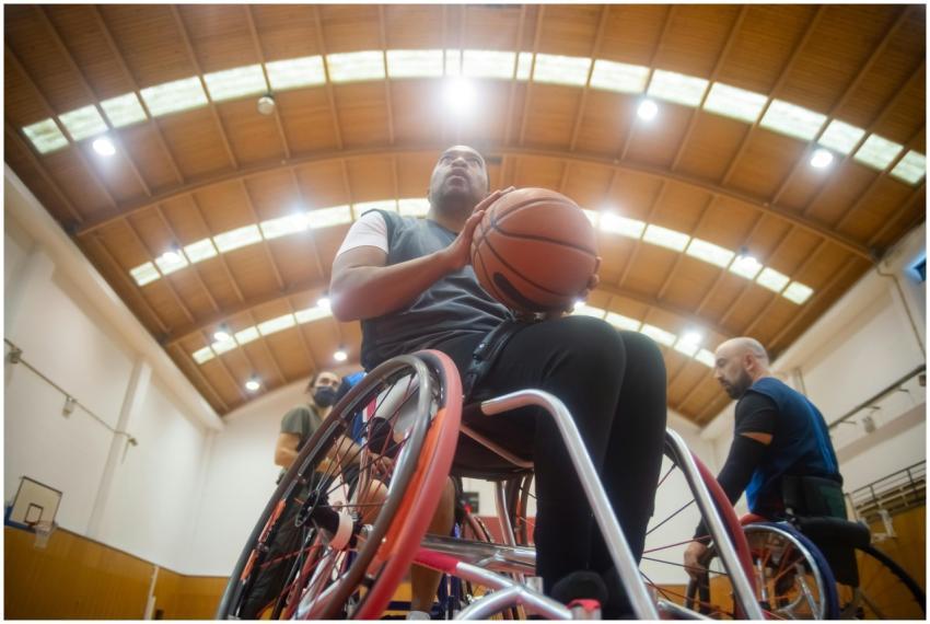 Athletes engage in wheelchair basketball training