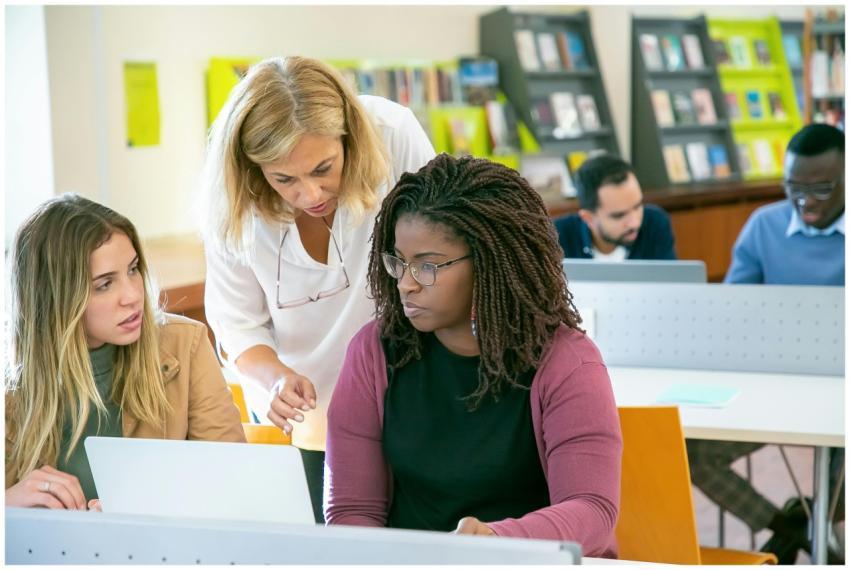 Multiracial group of university students and teach