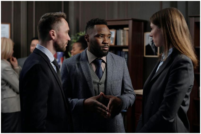 Diverse business team engaged in a serious discuss