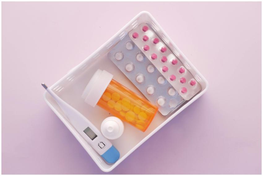 Overhead shot of medical supplies including pills