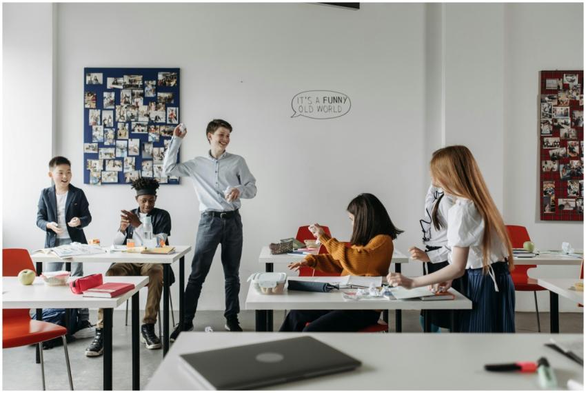 Students interact playfully in a modern classroom