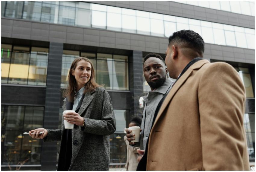 A group of diverse professionals discussing busine
