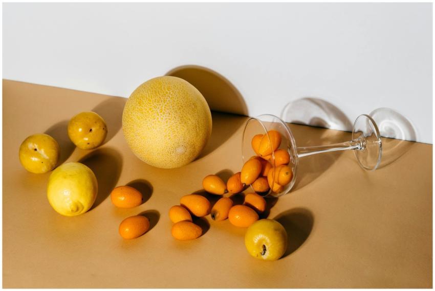 A minimalist arrangement of fresh citrus fruits in