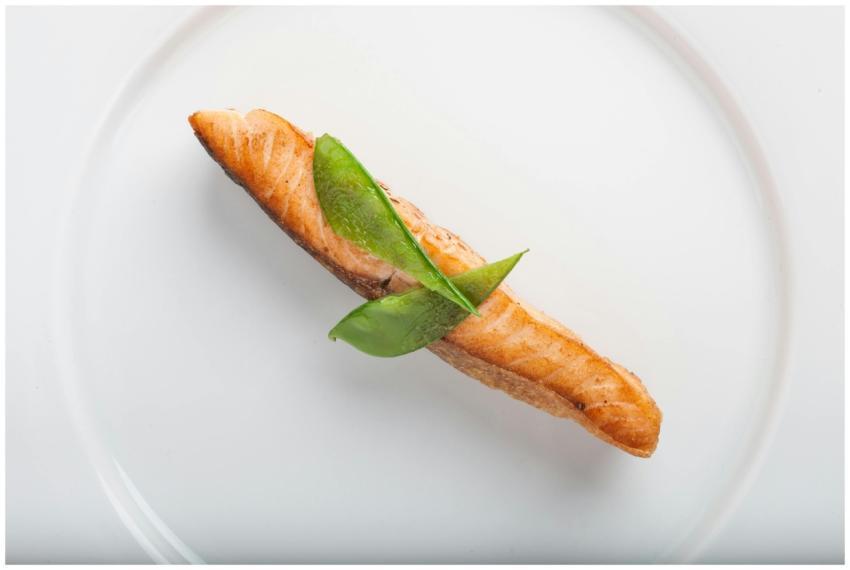 Elegant dish of grilled salmon fillet with green g