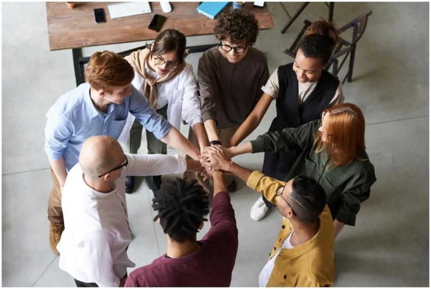 Top view of diverse group of people collaborating