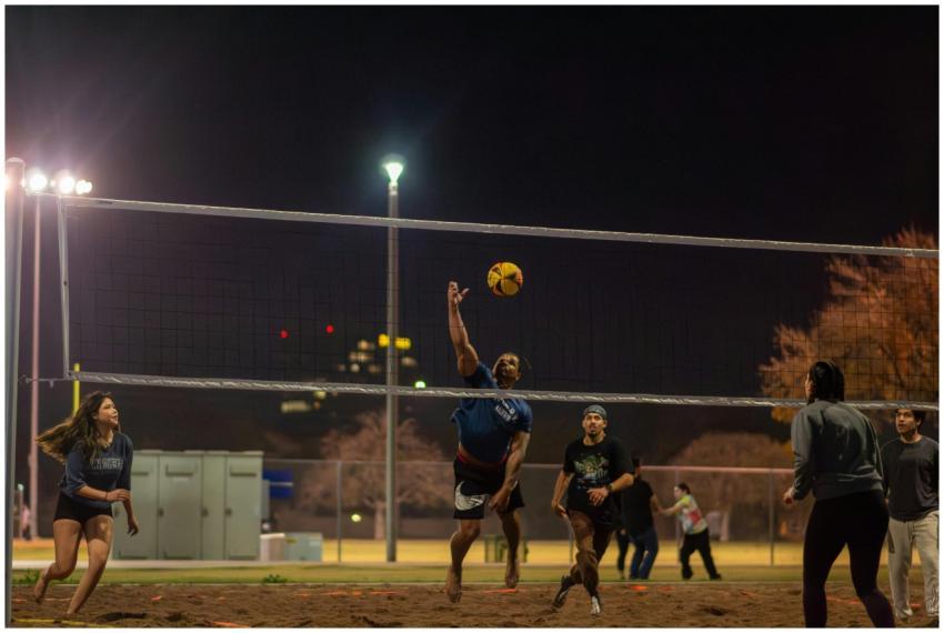 Amateur volleyball players enjoy a dynamic game un