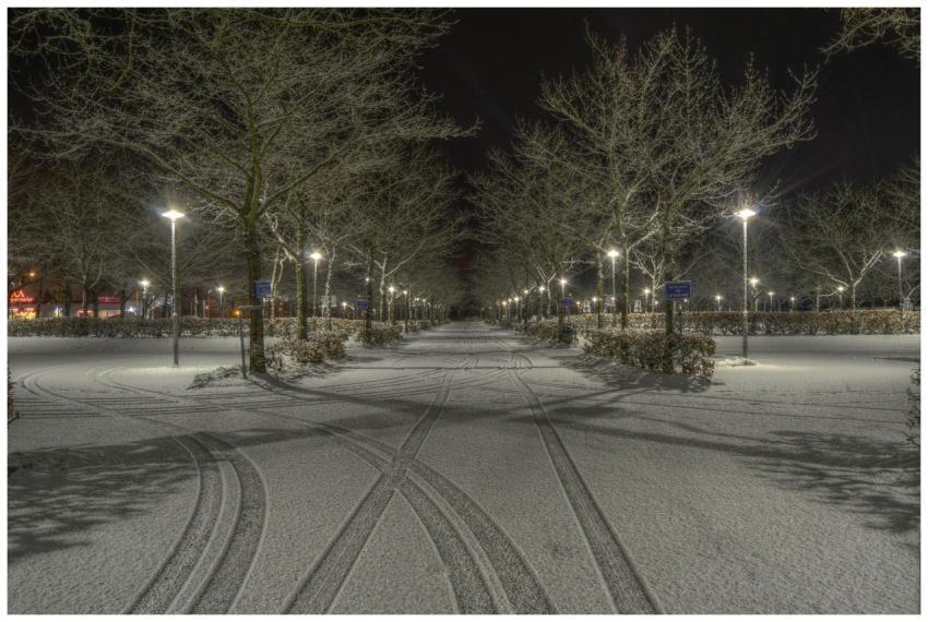 Serene winter night scene in Norrtälje, Sweden wit