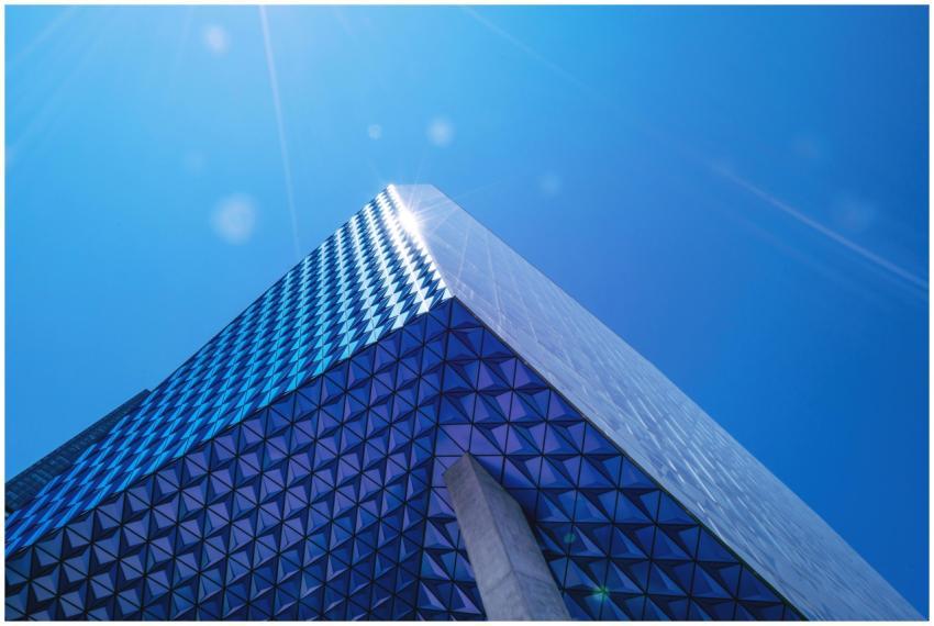 Modern architectural design featuring a tall glass