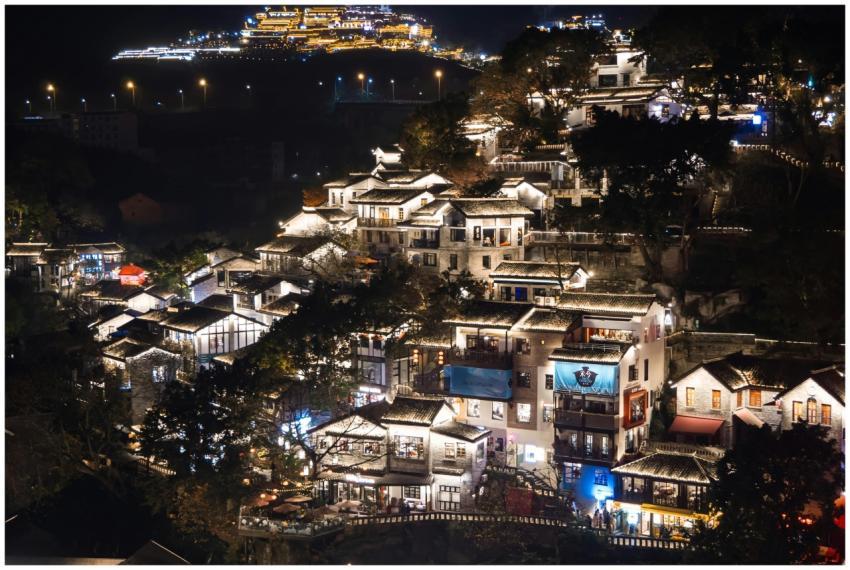 Stunning night view of illuminated traditional bui