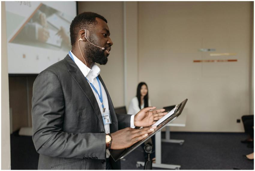 Professional speaker at a business conference pres