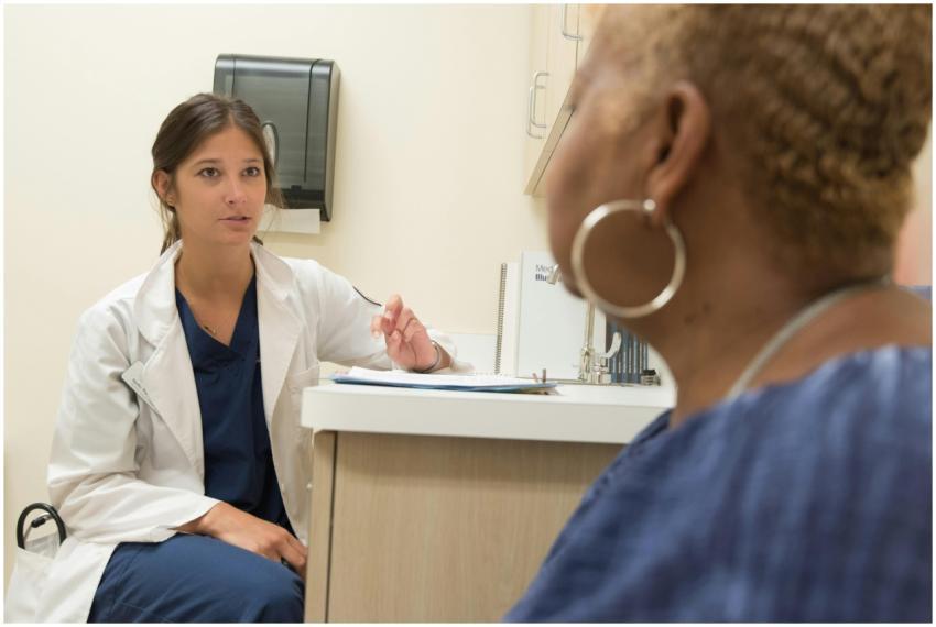 Doctor in consultation with patient at a medical c