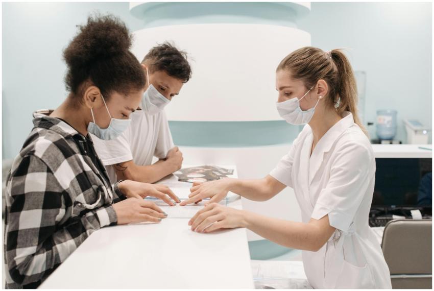 A healthcare professional in a medical setting ass