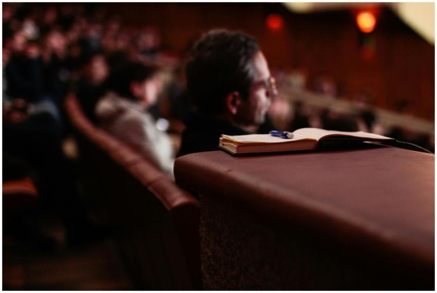 A focused shot of a notebook and pen in an auditor
