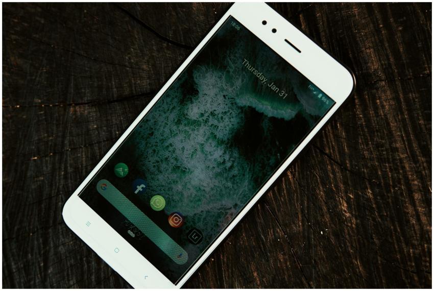 A close-up shot of a smartphone displaying social