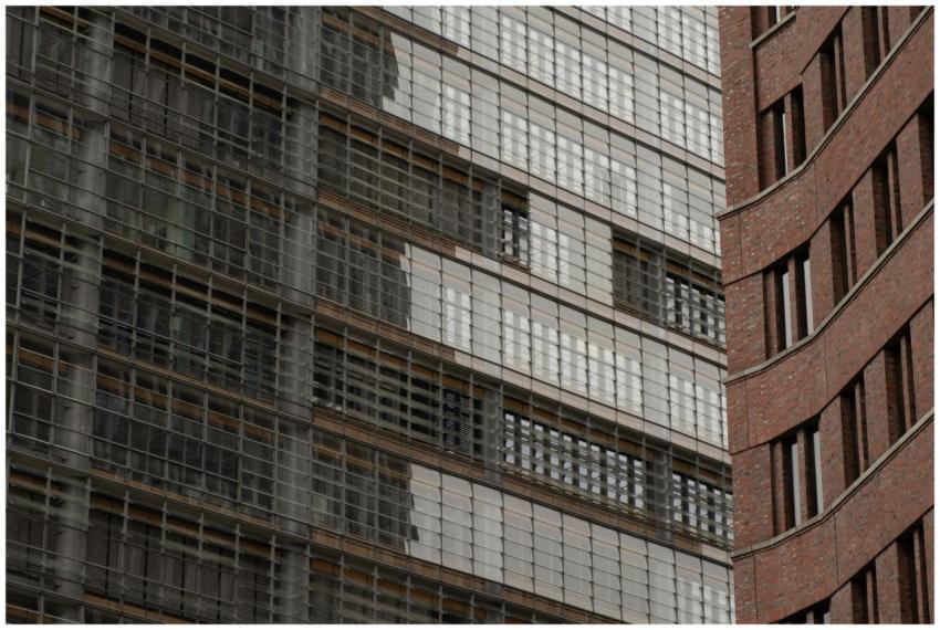 Close-up view of modern building exteriors with gl