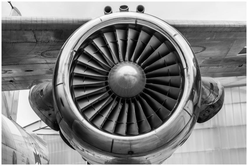 Detailed view of a jet engine in monochrome, showc