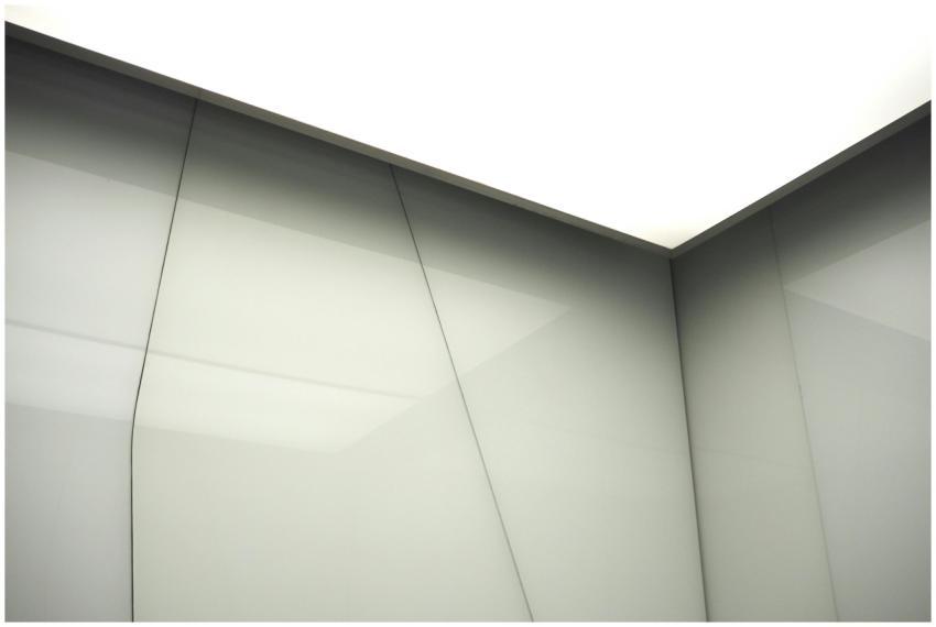 Sleek modern interior featuring geometric wall pat