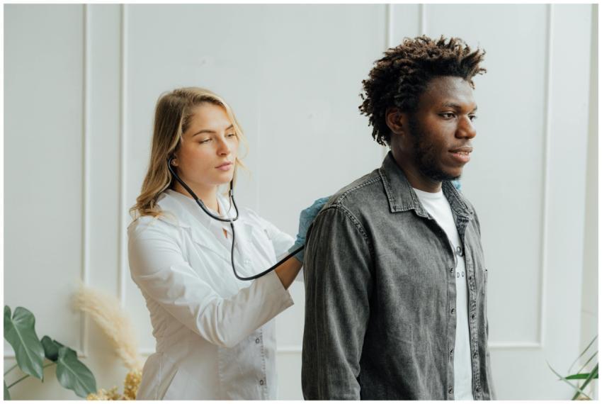 Doctor conducting check-up on patient with stethos