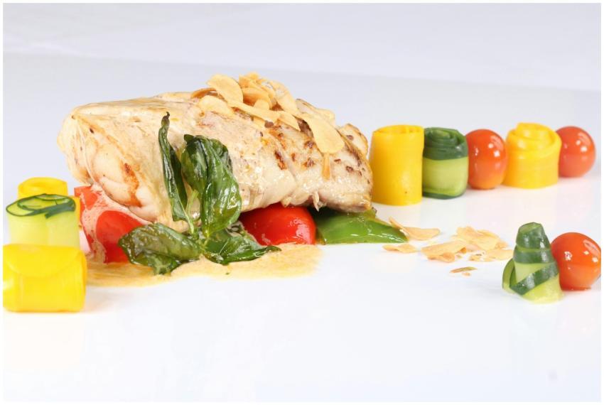 Beautifully plated salmon with vibrant vegetables