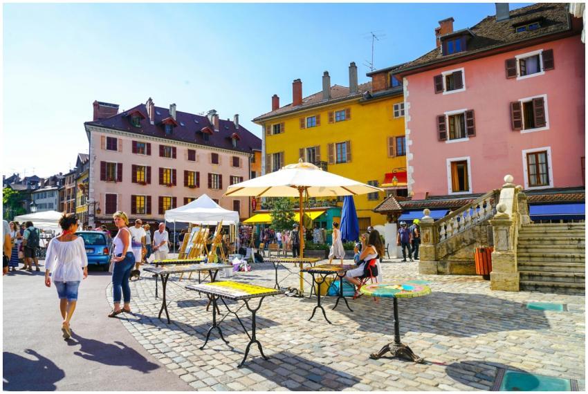 Charming marketplace in Annecy, France with bright