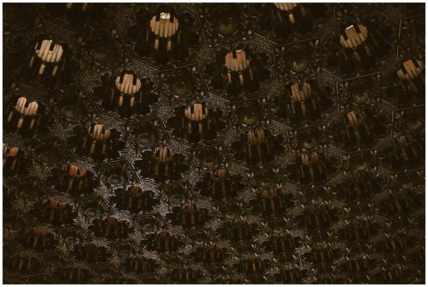 A detailed abstract ceiling with Islamic geometric