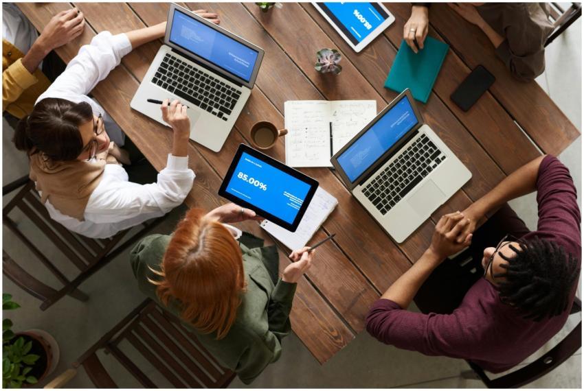 Diverse team discussing business strategies with l