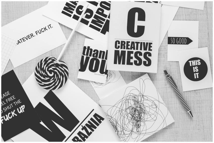 Monochrome desk scene with creative typography, ca