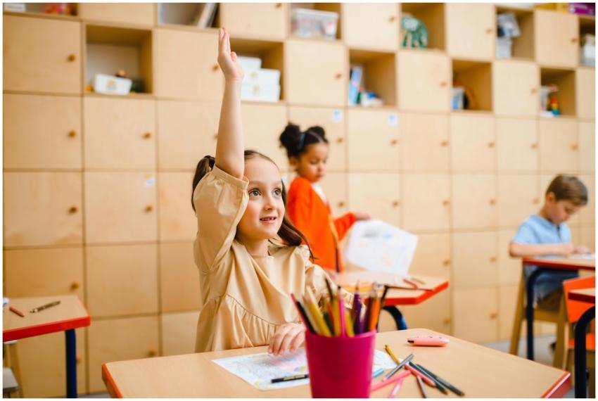 Happy kids learning and participating in an engagi