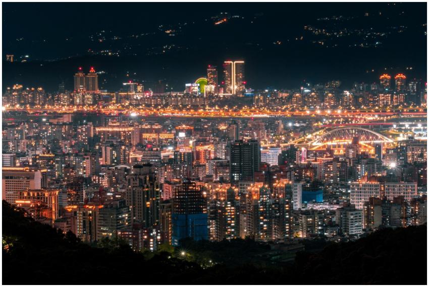 Stunning view of a bustling city skyline at night