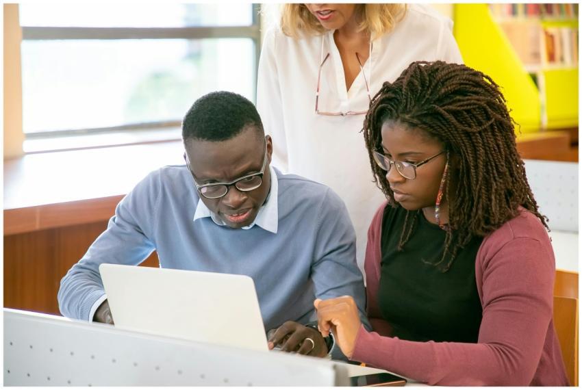 A group of diverse students collaborating and stud