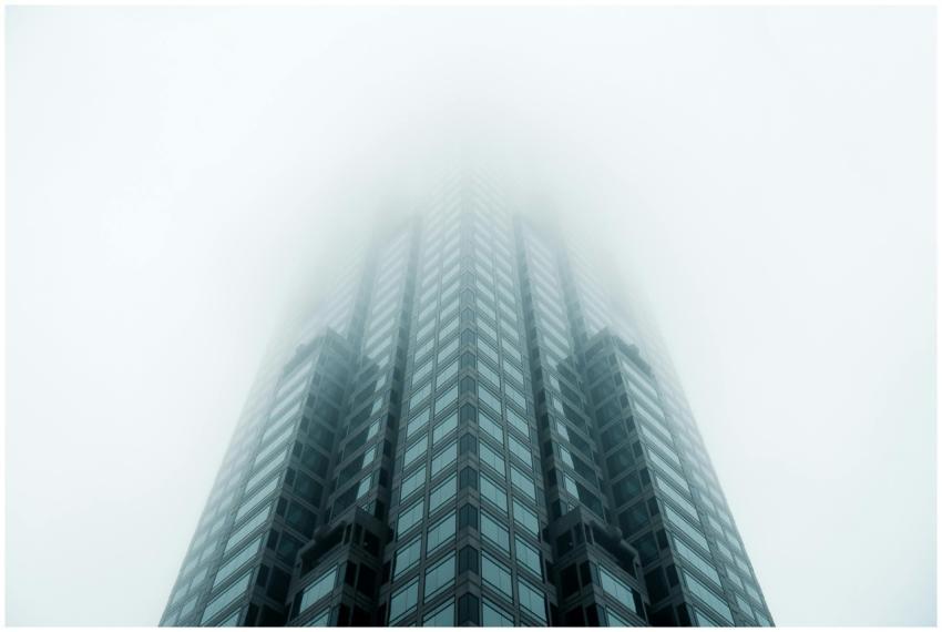 Low angle view of a modern skyscraper disappearing