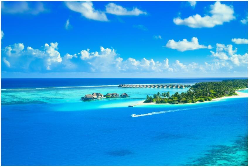 Aerial view of a luxurious tropical resort on a pr